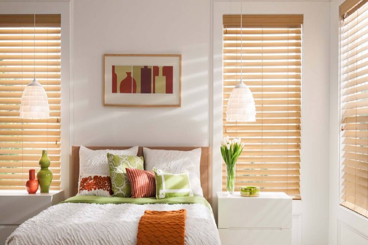 Alta Faux Wood Blinds hanging on a bed room window near Helena, Montana (MT)