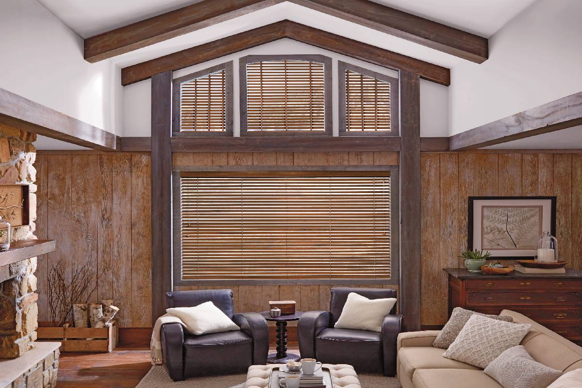 Hunter Douglas Parkland® Wood Blinds on a window near a fireplace near Helena, Montana (MT)